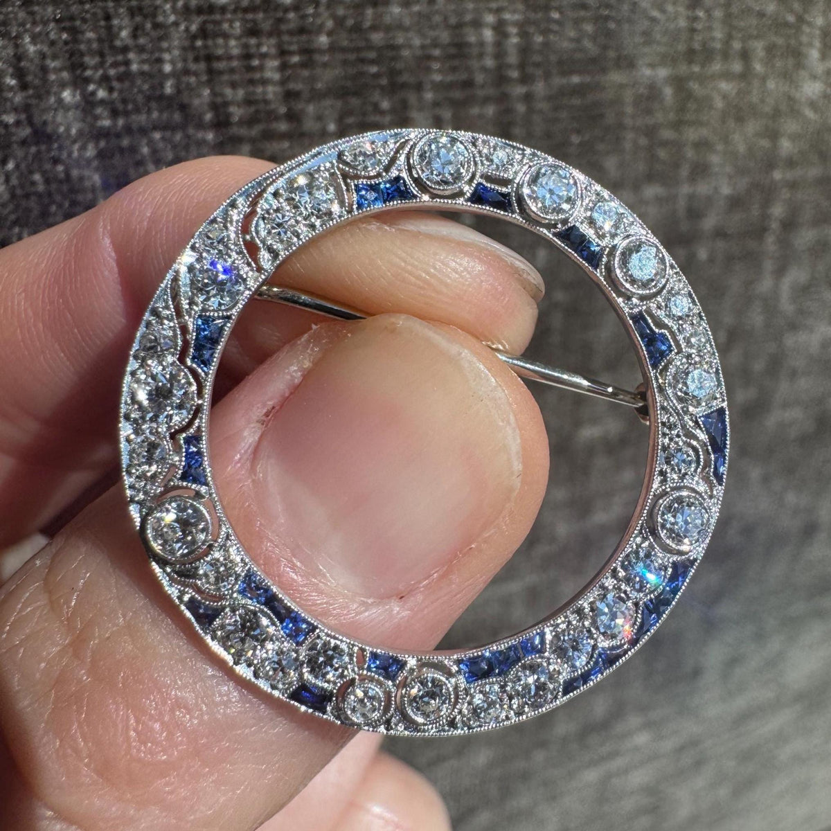 1920's Art Deco Natural Diamond and Sapphire Circle Brooch in 14k White Gold