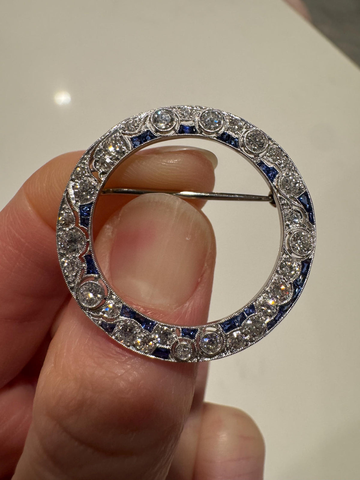 1920's Art Deco Natural Diamond and Sapphire Circle Brooch in 14k White Gold